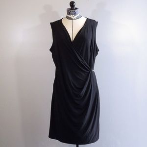Calvin Klein black sleeveless dress with gold pin